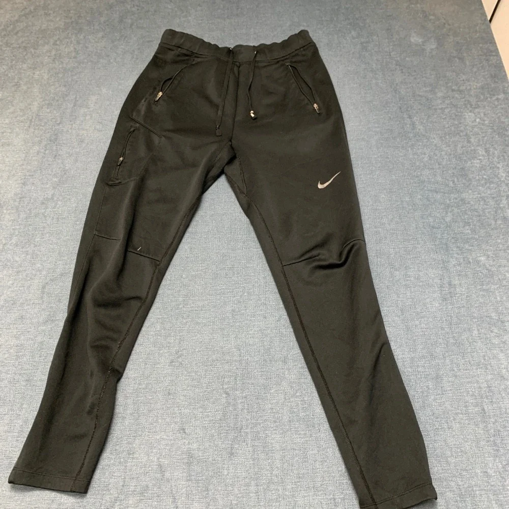 Nike Dri Fit Track Pants Mens S Black Swoosh Logo Drawstring Waist Tapered Leg